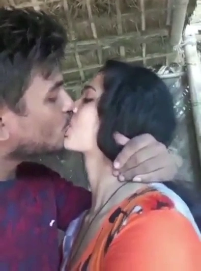 Cuple kissing in village