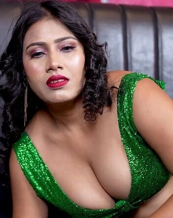 Booby anamika huge cleavage show seductive photoshoot in sofa